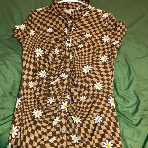 brown button up dress with flowers. worn once on a trip to NYC very short sleeve